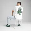 PUMA GRAPHICS Super Puma Tee Beyaz Erkek T-Shirt