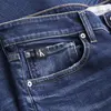 Calvin Klein SLIM TAPER Erkek mavi Kot Pantolon
