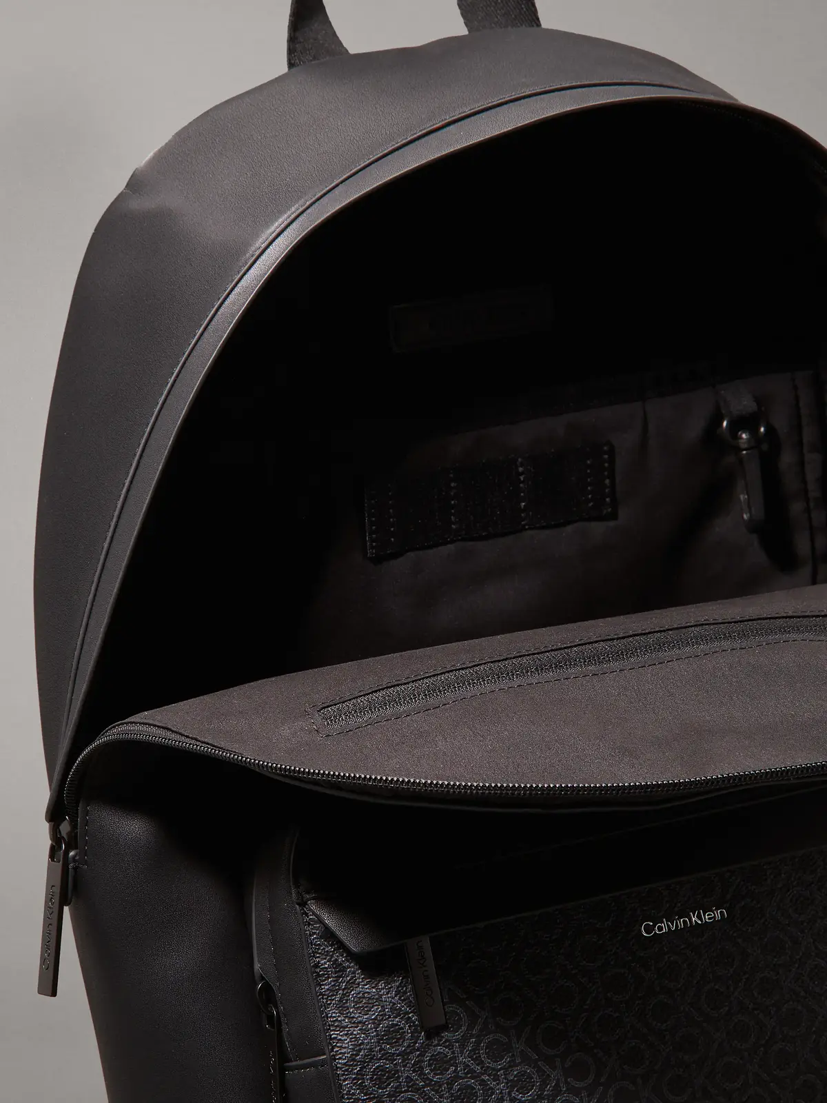 Calvin Klein CK MUST ROUND BP MON, 0GJ Siyah Erkek Çanta