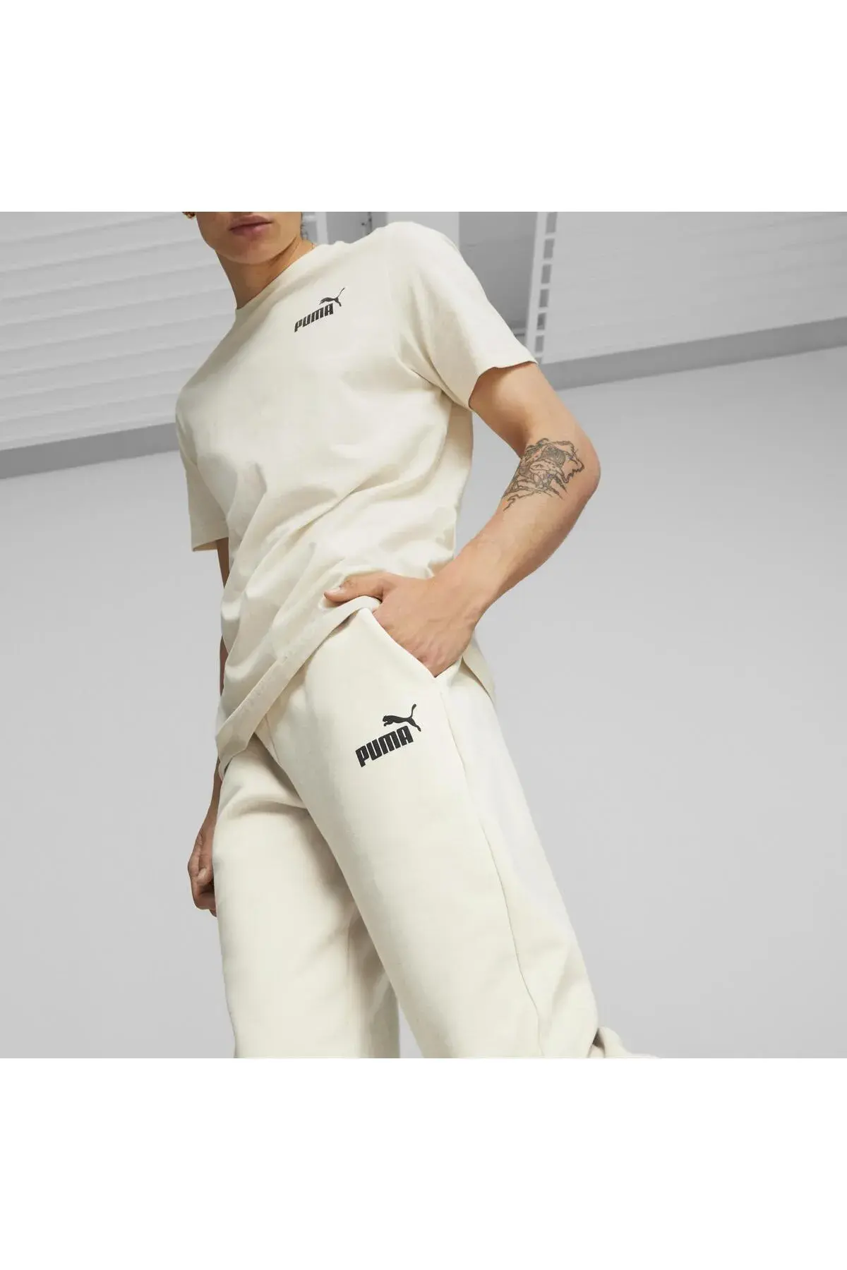 Puma ESS ELEVATED Sweatpants FL cl Kırık Beyaz Erkek Eşofman Altı