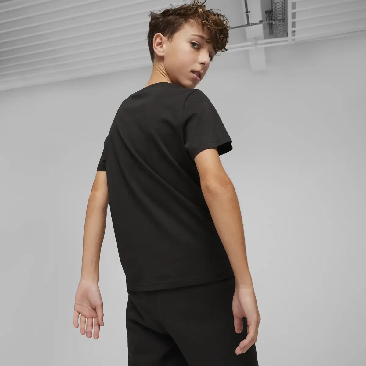 Puma GRAPHICS Year of Sports Tee Siyah Erkek T-Shirt & Polo