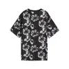 Puma ESS+ CLASS ACT AOP Tee Siyah Kadın T-Shirt