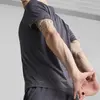 PUMA M TAD ESS SOLID CAT TEE LC Gri Erkek T-Shirt
