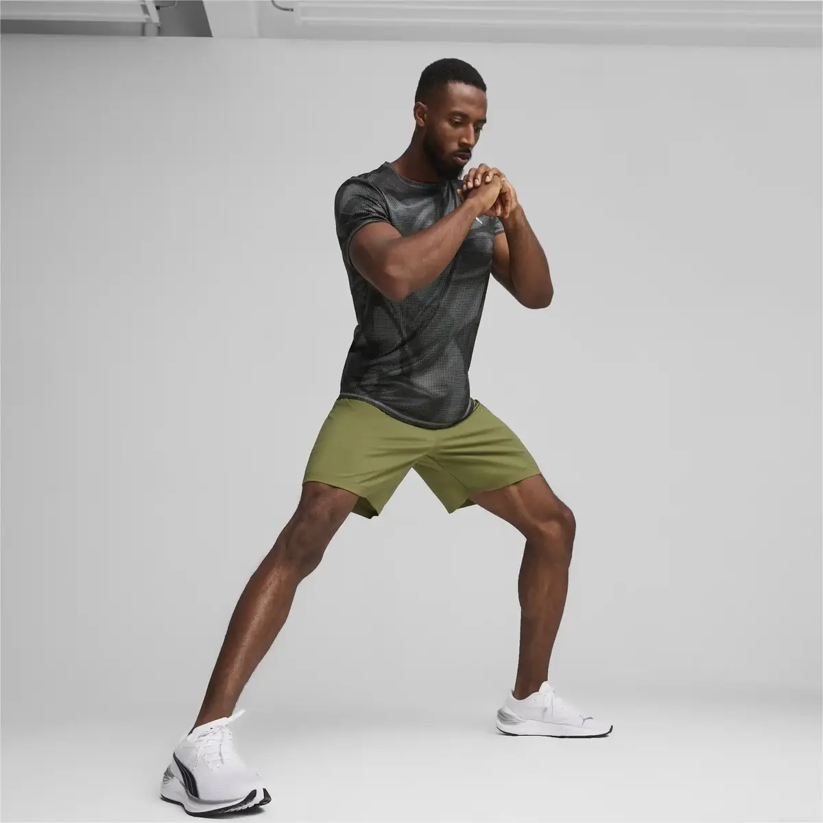 Puma RUN FAVORITE AOP SS TEE M Siyah Erkek Antrenman Üst