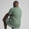 Puma ESSENTIALS HEATHER CAT Tee Erkek T-Shirt & Polo