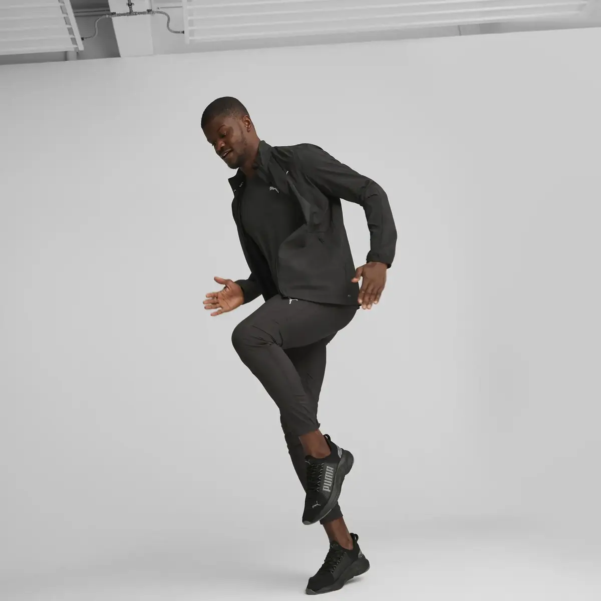 Puma RUN FAVORITE TAPERED PANT M Siyah Erkek Eşofman Altı