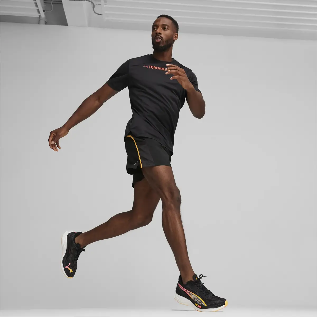 Puma RUN FAVORITE SS GRAPHIC TEE M Siyah Erkek T-Shirt