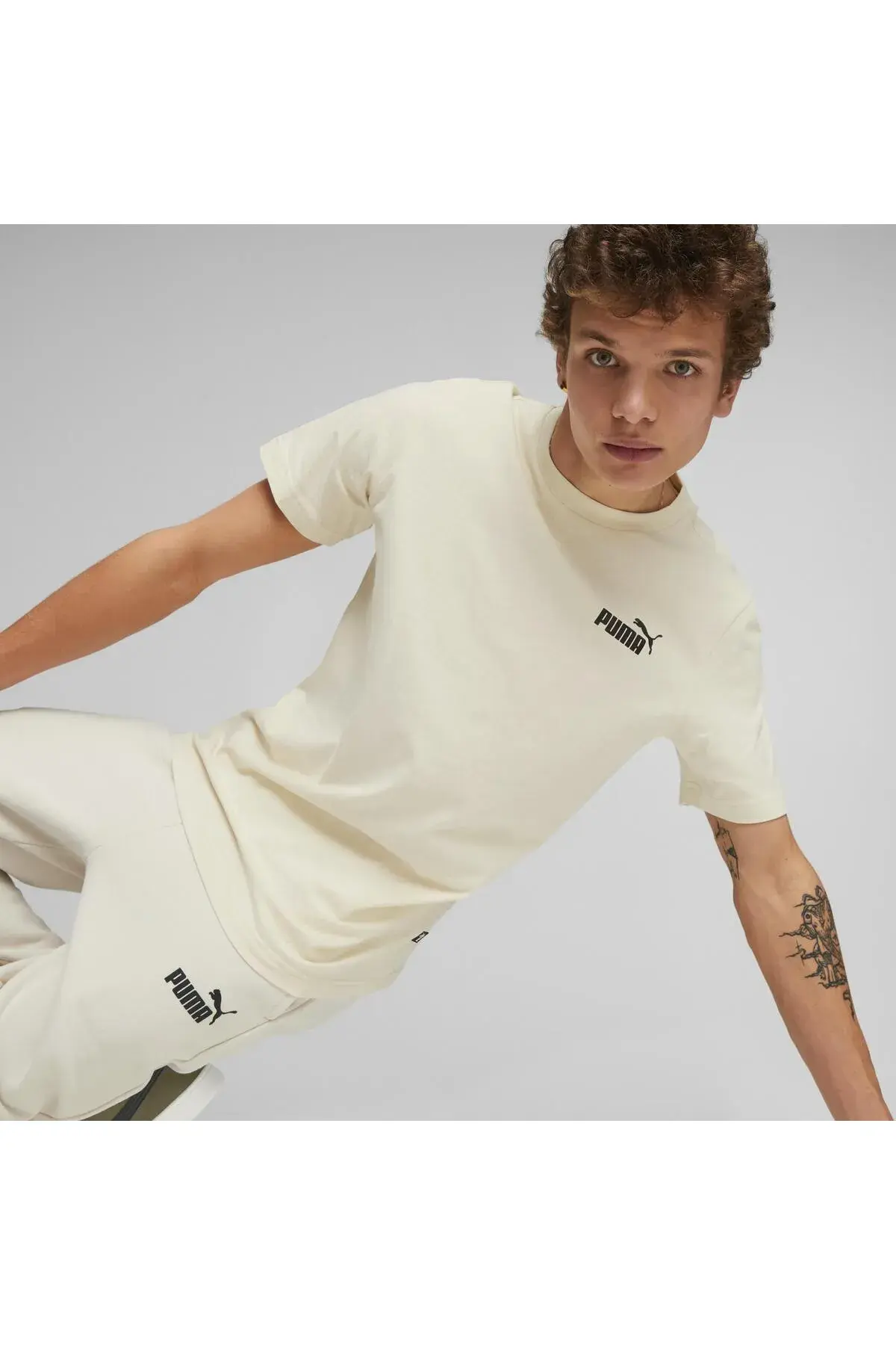 Puma ESS ELEVATED Execution Tee Kırık Beyaz Erkek T-Shirt