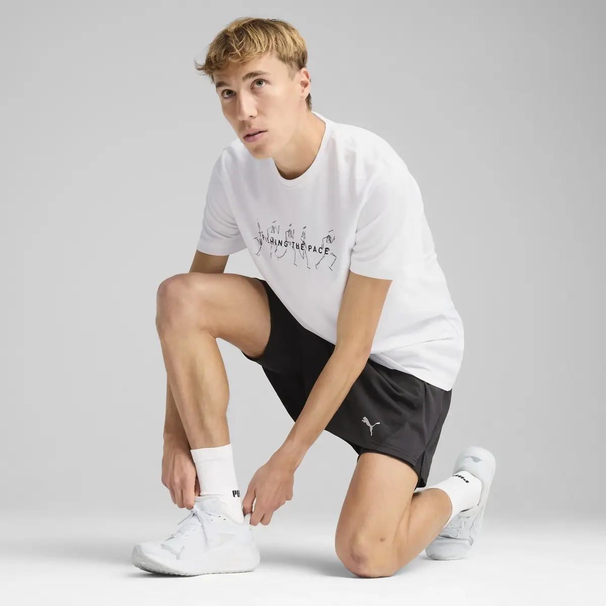 Puma GRAPHICS RUNNING ILLUSTRATIO Beyaz Erkek T-Shirt