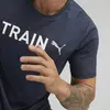 Puma Men s Graphic Tee Training Lacivert Erkek/Unisex Koşu ve Performans T-Shirt