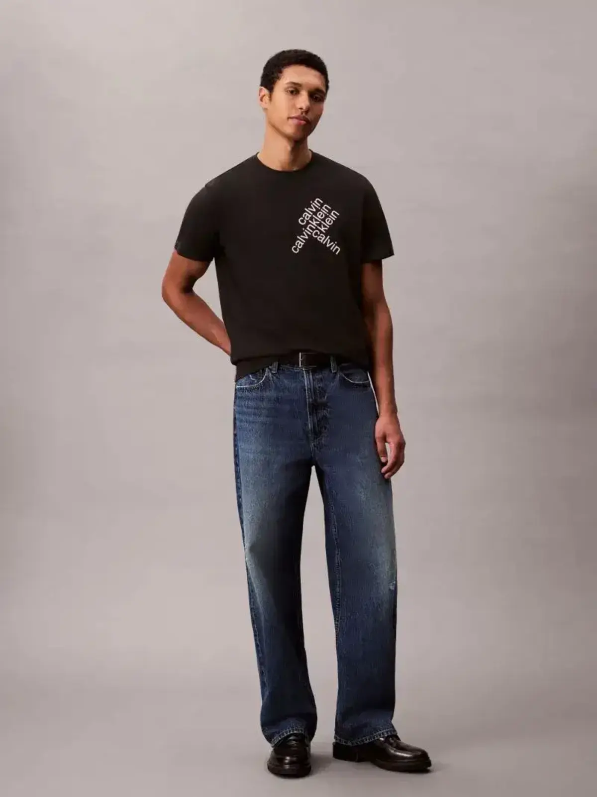 Calvin Klein SS 30S EU CK BH WORD STACK GRAPH Siyah Erkek Tişört