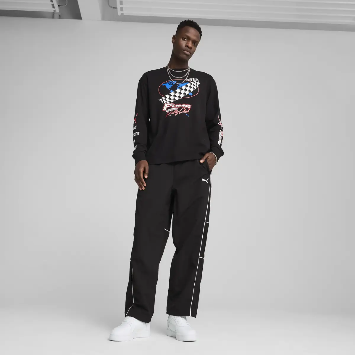 Puma GRAPHICS Moto Relaxed LS Tee Siyah Erkek T-Shirt & Polo