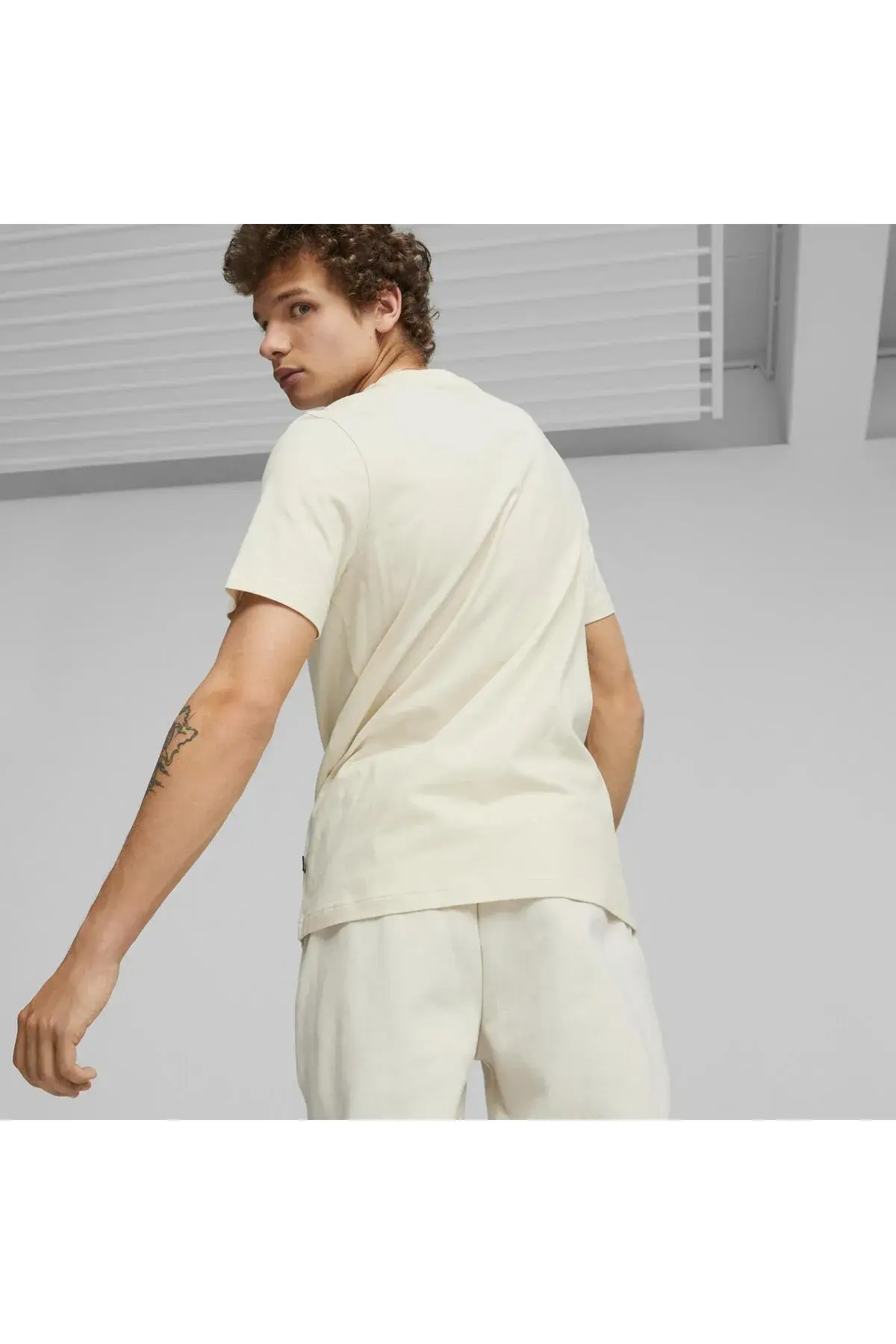 Puma ESS ELEVATED Execution Tee Kırık Beyaz Erkek T-Shirt